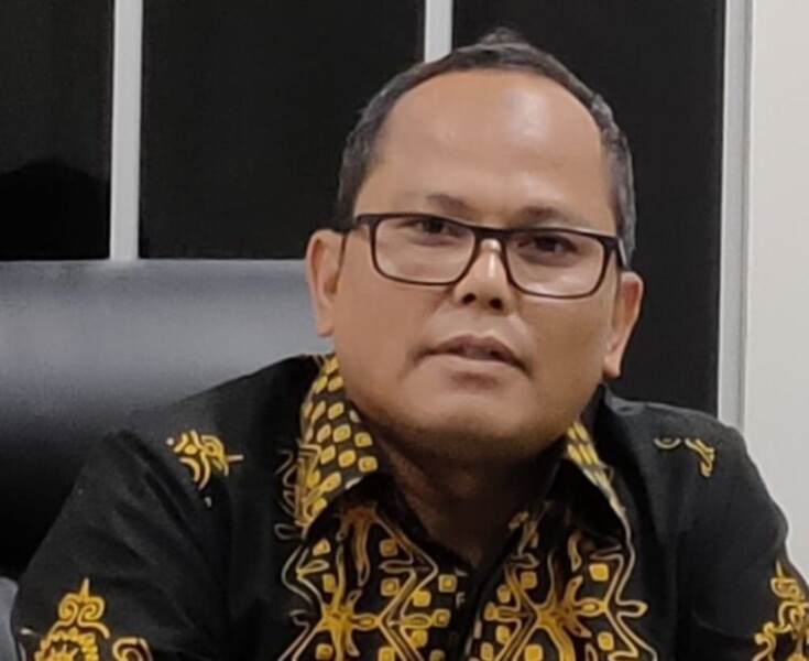 Ketua KPU Riau Rusidi Rusdan,